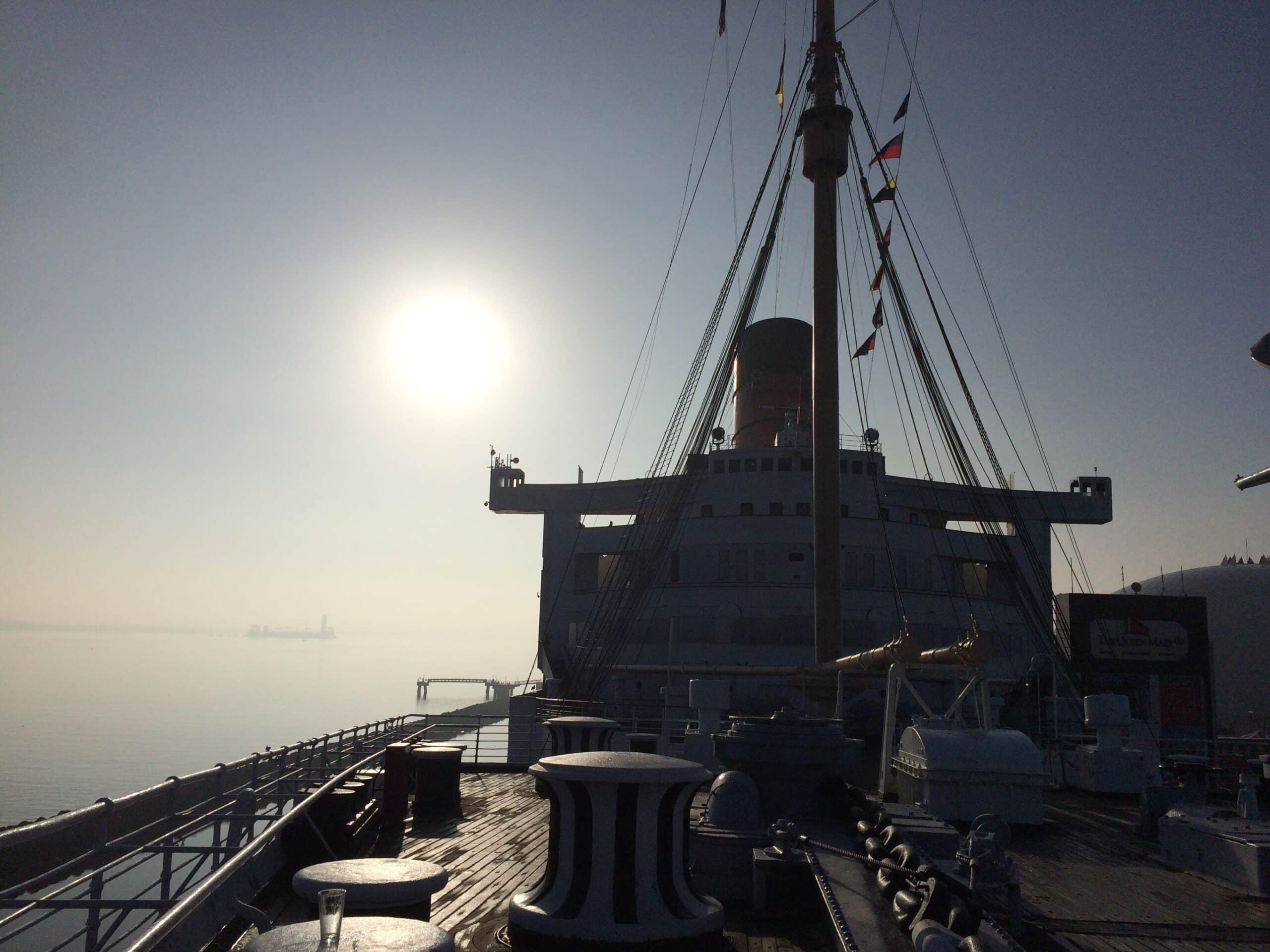 Early morning deck aboard RMS Queen Mary with quiet haunted ship atmosphere